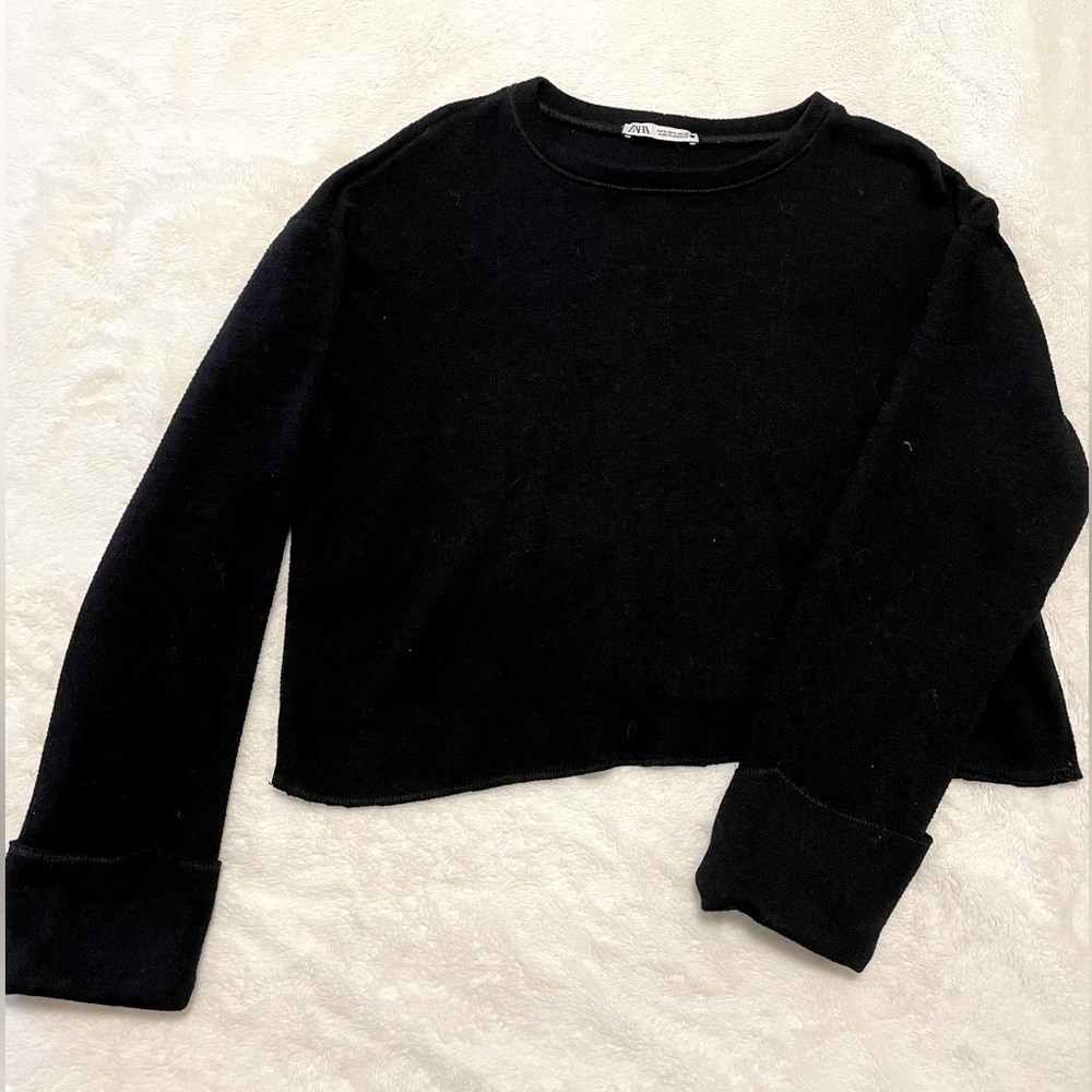Zara black sweater, slightly cropped with sleeves folded on the ends